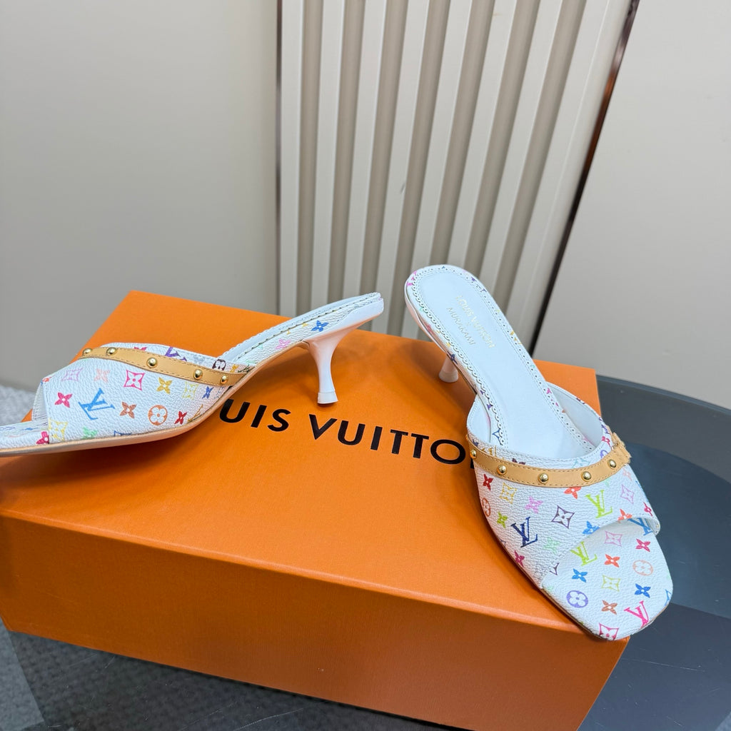 Louis Vuitton ladies heeled mules, angled view, white multicolor monogram print, gold stud strap