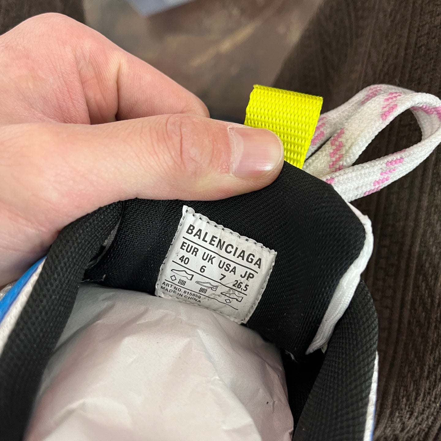 Unisex sneaker interior size label with BALENCIAGA text and fabric lining.