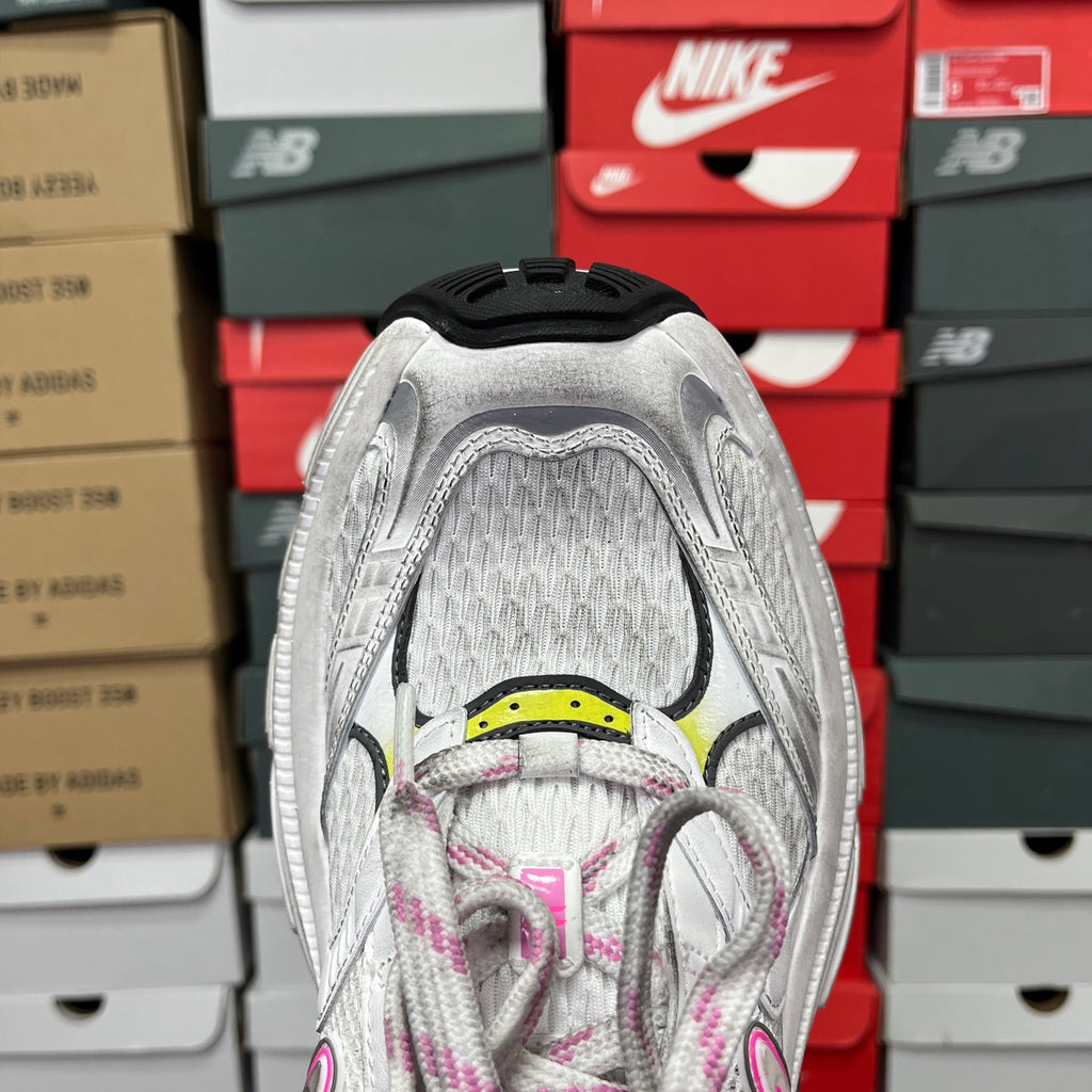 Unisex sneaker heel and tongue view with textured lining and multicolor laces.