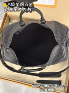 Men's monogram duffel bag, dark gray, open interior view with zippered opening