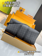 Men's monogram duffel bag, dark gray, angled view with top handle and zipper front