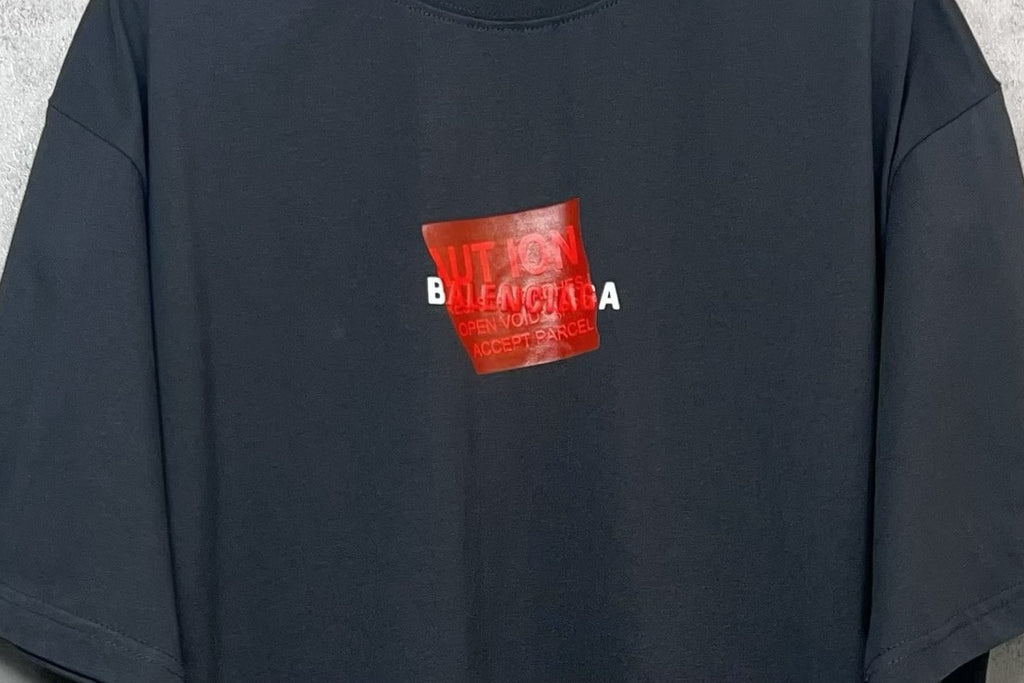 Balenciaga short-sleeve T-shirt, dark navy, red logo graphic on chest