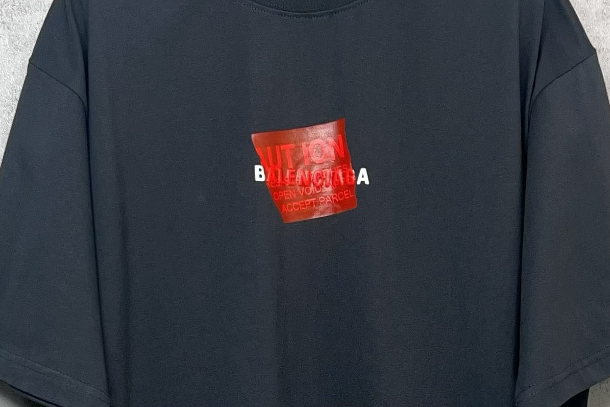 Balenciaga short-sleeve T-shirt, dark navy, red logo graphic on chest