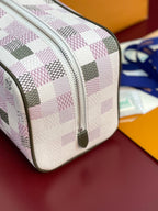 Louis Vuitton crossbody bag front close-up, multicolor check pattern with zipper