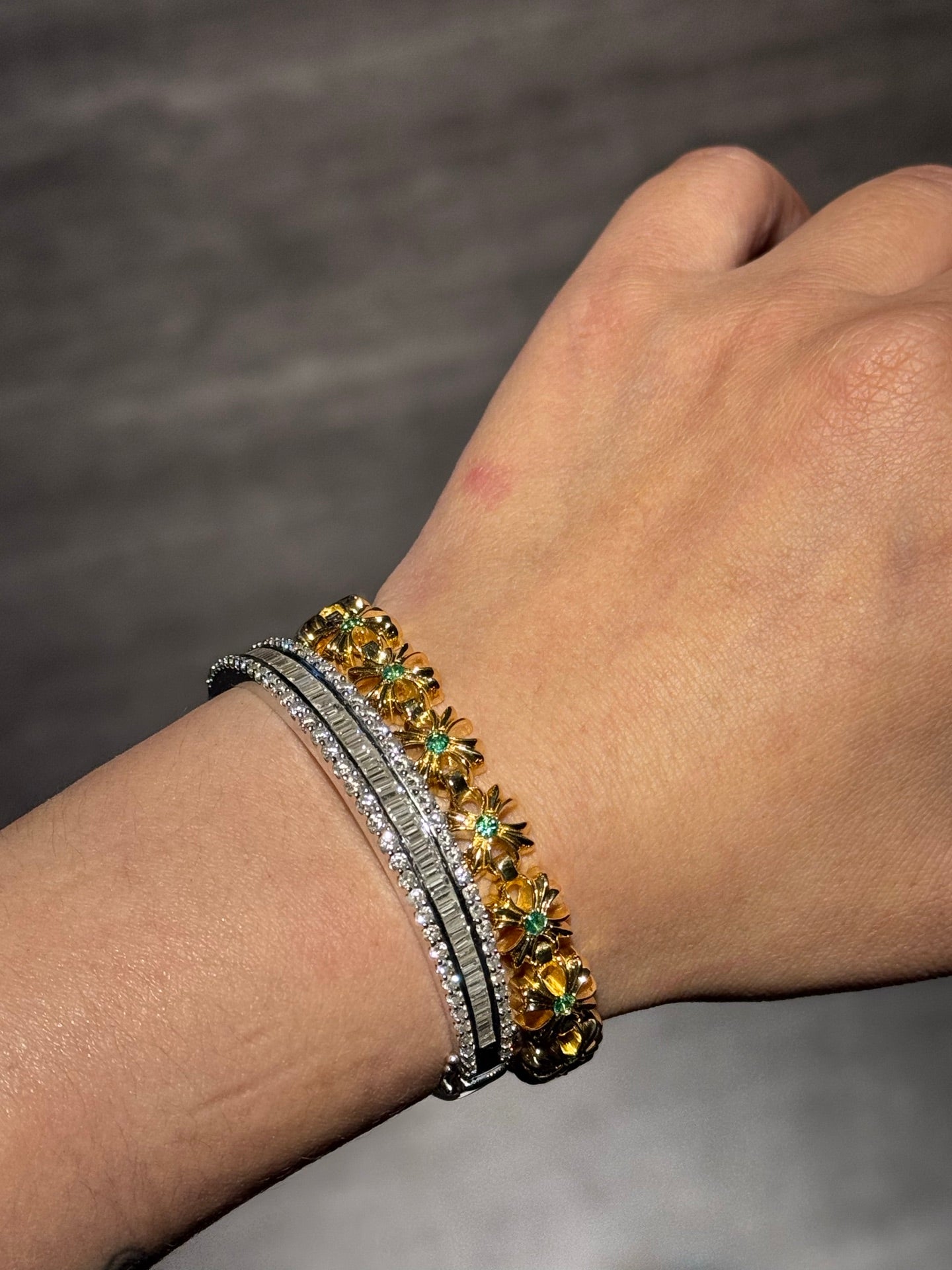 Two bracelets: gold-tone teal-stone link bracelet and silver-tone pave bracelet