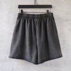 Dark gray denim shorts with elastic waistband and straight legs