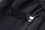 Dark gray shorts interior label with size and brand tags