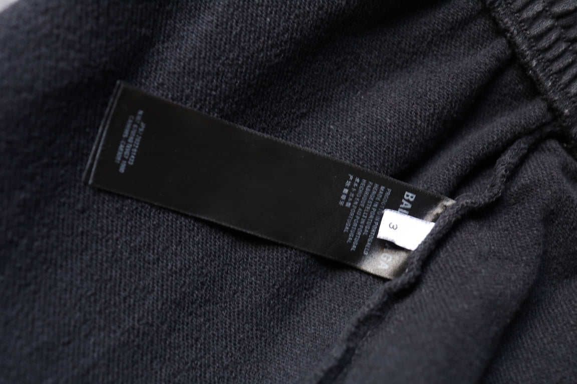 Dark gray shorts interior label with size and brand tags