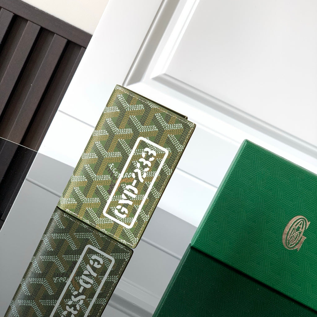 Goyard-pattern card holder with green leather, logo patch and snap closure