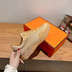 Hermes unisex beige lace-up sneakers with gum-colored ribbed sole and laces