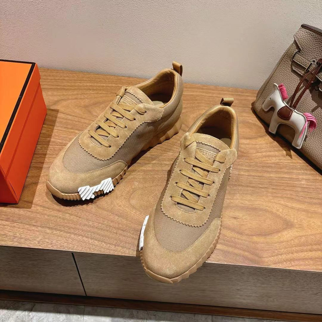 Tan suede and fabric lace-up sneakers with white heel and side accents