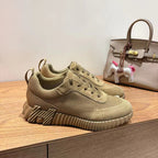 Hermes unisex suede sneakers, olive, lace-up with white logo accent and ridged sole