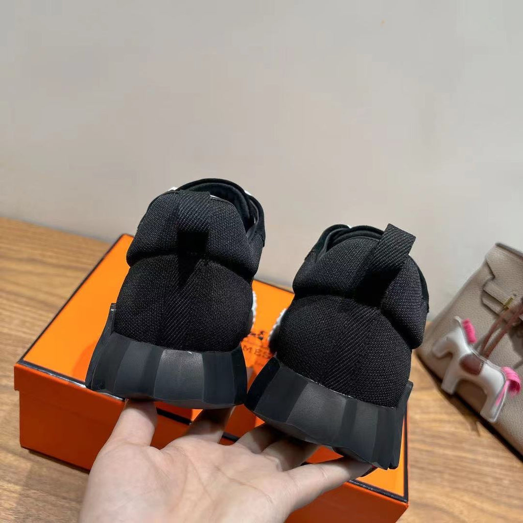 Hermes unisex sneakers, black with rear pull tab and ribbed heel sole