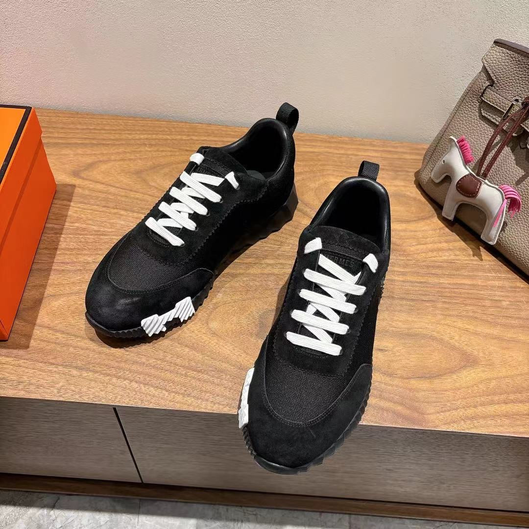 Hermes unisex sneakers, black lace-up shoes with white laces and serrated tread