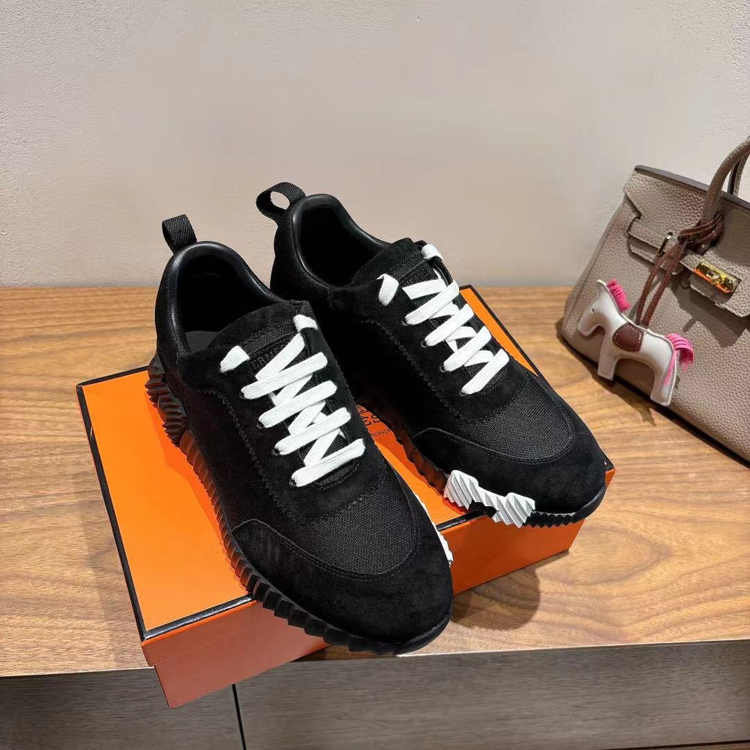 Hermes unisex sneakers, black with white laces and platform-style ribbed sole