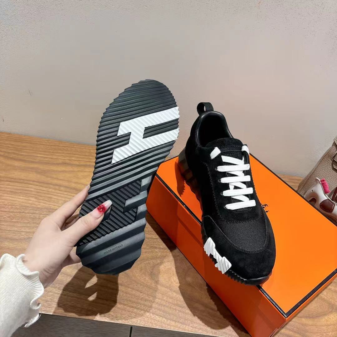 Hermes unisex sneakers, black outsole with white logo mark and zigzag tread pattern