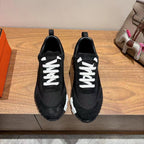 Hermes unisex sneakers, black with white laces and chunky rubber sole