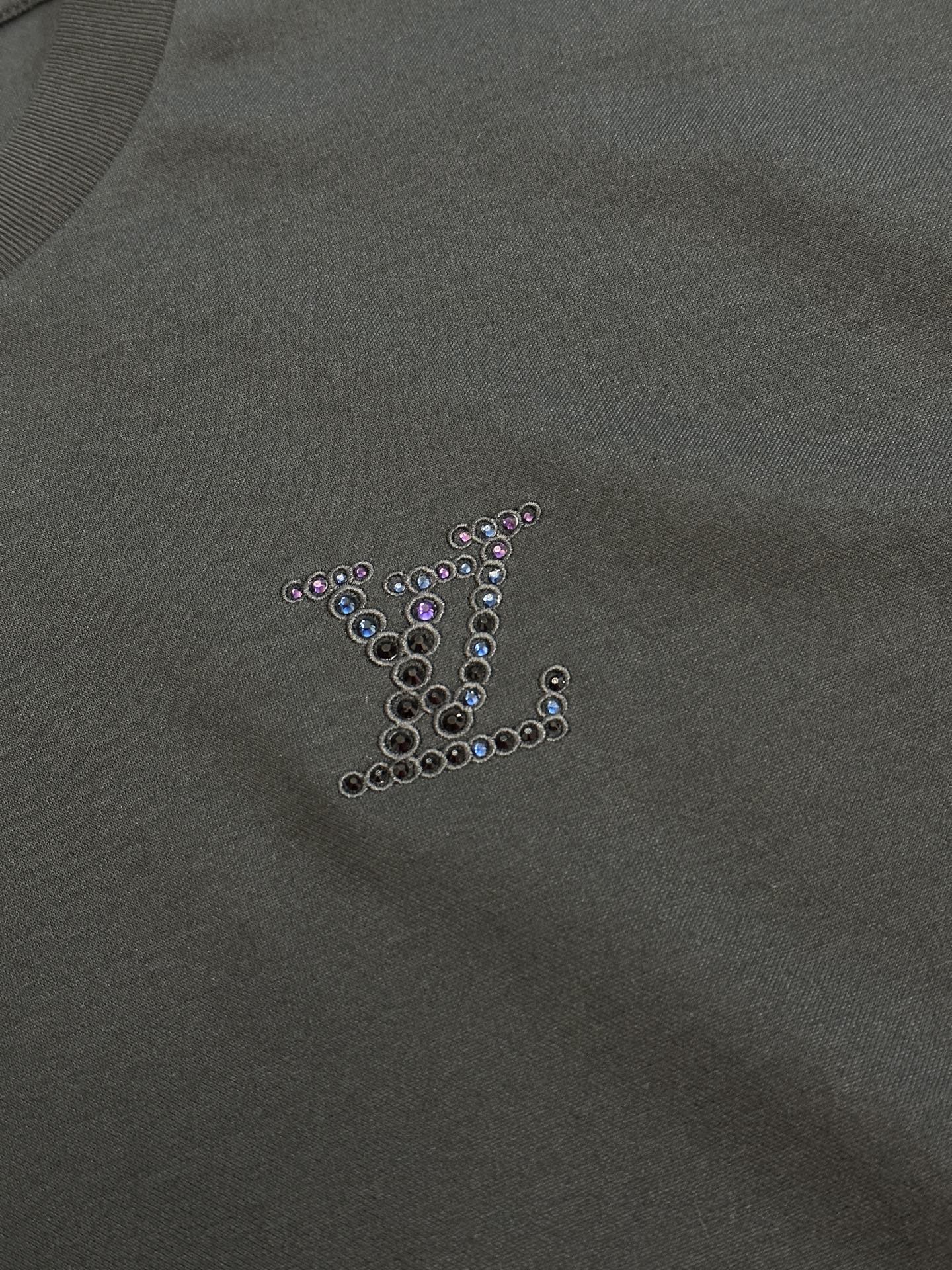 Dark charcoal sweatshirt fabric with rhinestone monogram on chest