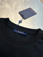 Dark charcoal crew-neck sweatshirt with brand tag and hang tag at collar