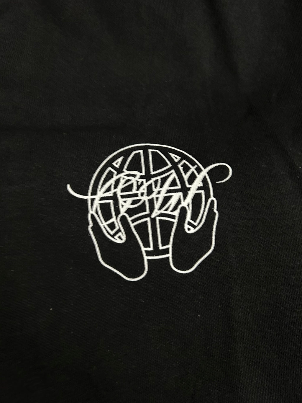 Off White black T-shirt close-up of white line-art logo
