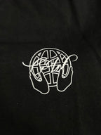 Off White black T-shirt close-up of white line-art logo