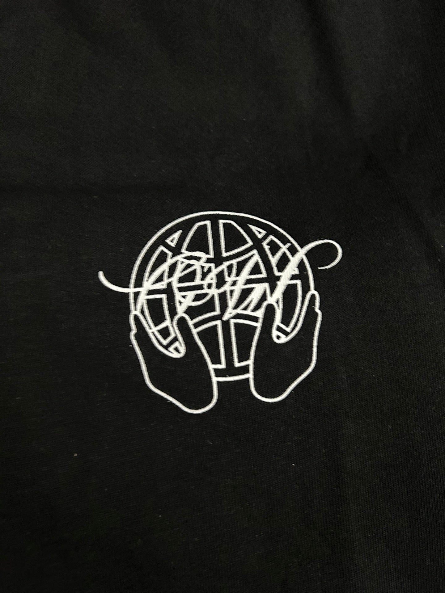Off White black T-shirt close-up of white line-art logo