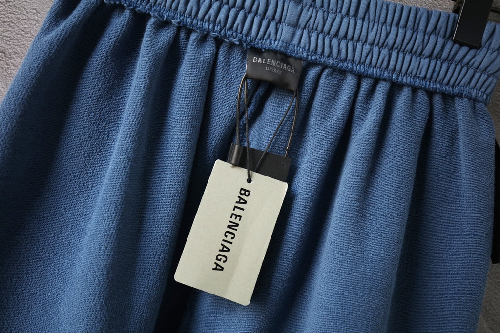 Balenciaga pants light blue with hang tag at waistband and pleated front