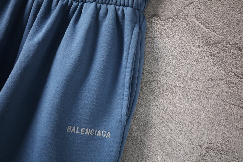 Balenciaga pants light blue with embroidered BALENCIAGA logo near hem