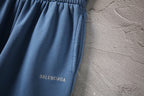 Balenciaga pants light blue with embroidered BALENCIAGA logo near hem