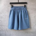 Balenciaga pants in light blue with elastic waistband and front pleats