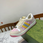 Unisex Gucci sneakers, cream canvas with pink emblem panel and yellow-blue stripe