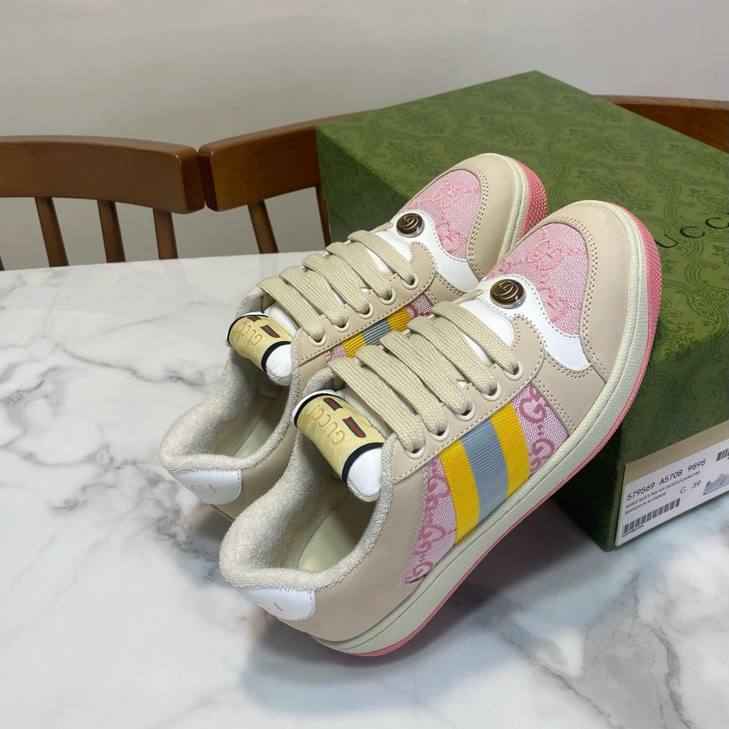 Unisex Gucci sneakers, cream with pink logo motif and multicolor stripe; red trim