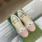 Unisex Gucci sneakers, cream laces with pink logo panel and rainbow stripe; pink sole