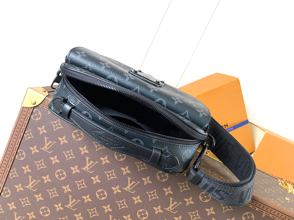 Men’s Louis Vuitton crossbody bag front view with zip opening and strap