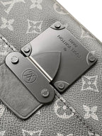 Men’s Louis Vuitton bag leather hardware plate on textured monogram fabric