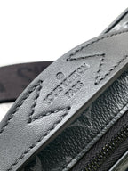 Men’s Louis Vuitton strap close-up with embossed “Louis Vuitton Paris”