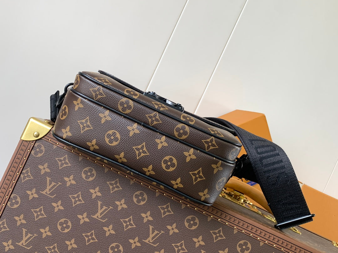 Men's Louis Vuitton monogram top-handle bag with zipper and shoulder strap