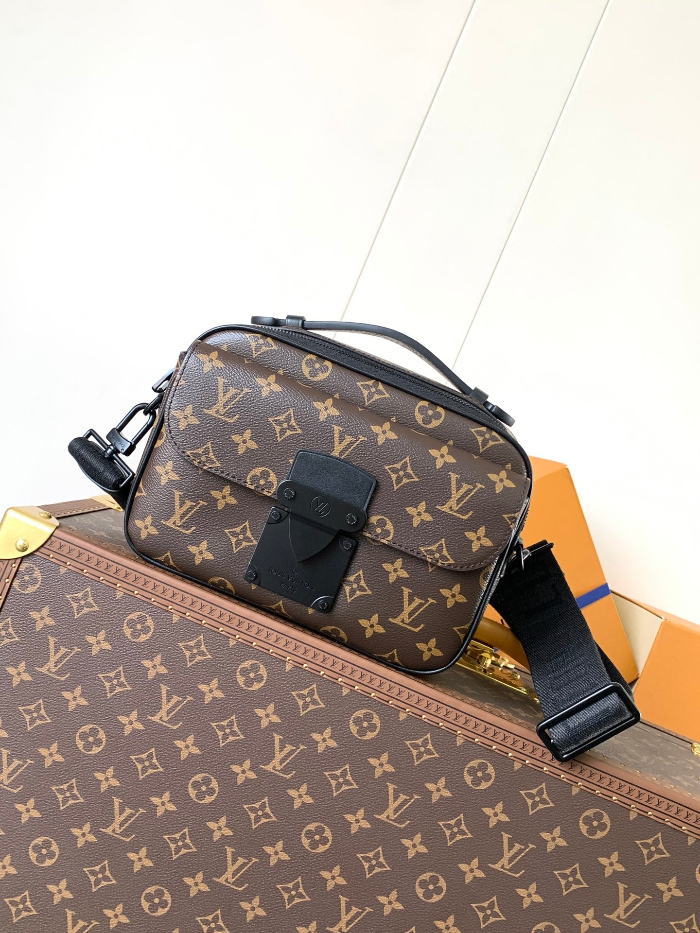 Men's Louis Vuitton monogram crossbody bag with flap and adjustable strap