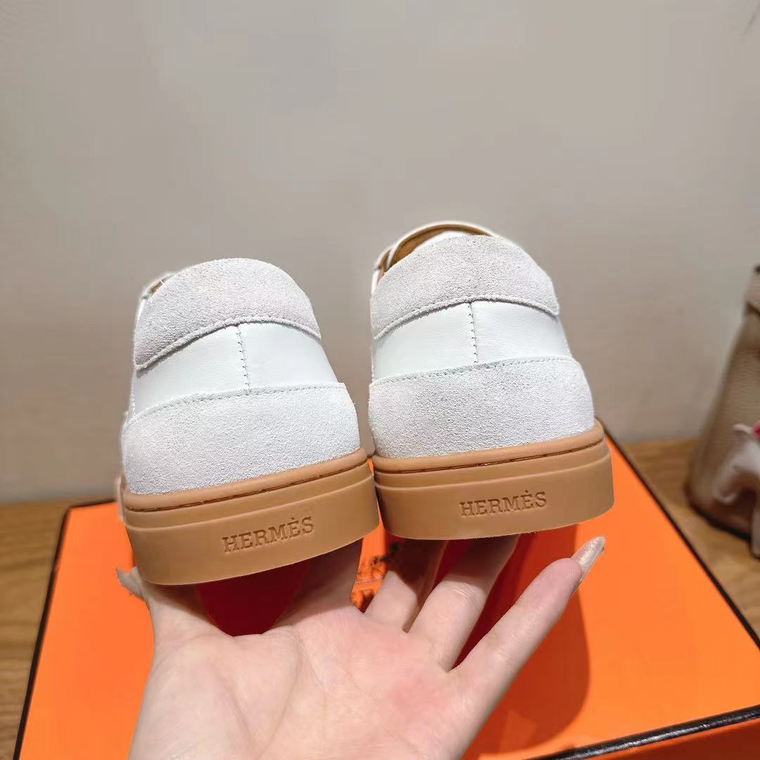 White leather sneakers with tan heel, HERMES logo on heel tab