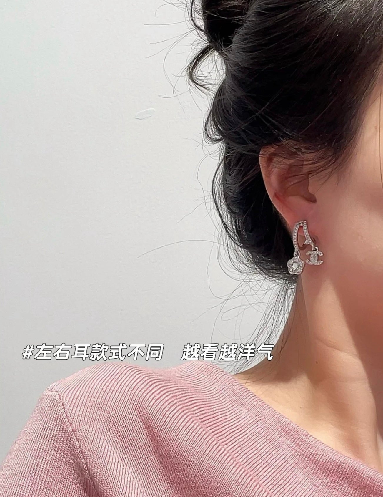 Hoop earrings with dangling charms, silver-tone, ear side close-up