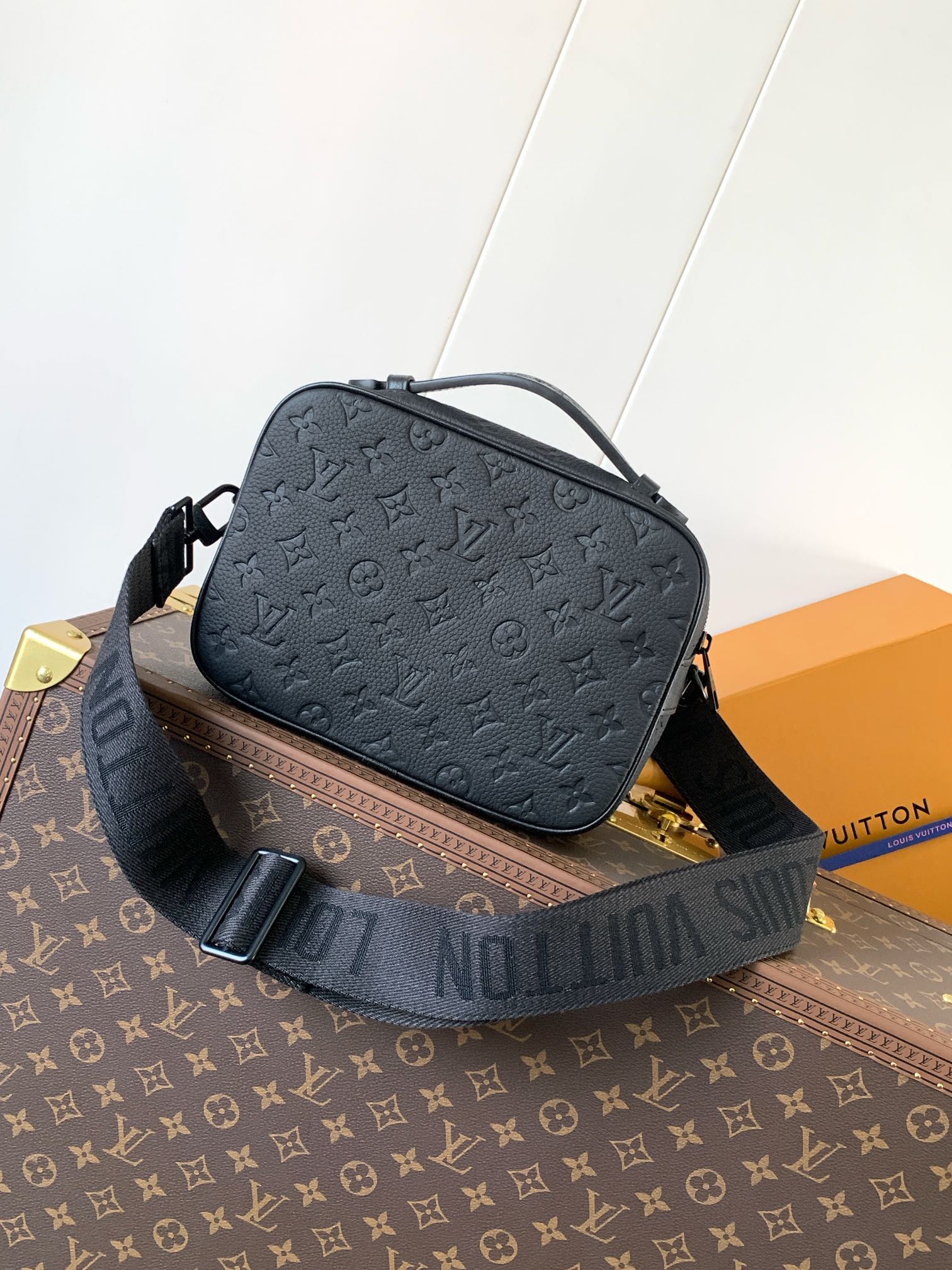 Men’s Louis Vuitton monogram shoulder bag, dark navy, curved top handle and flap