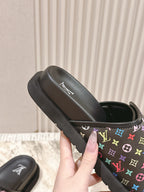 Louis Vuitton slide sandal, black strap with multicolor monogram and white logo