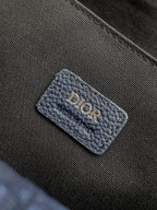 Blue Dior cardholder-style pocket with embossed Dior letters