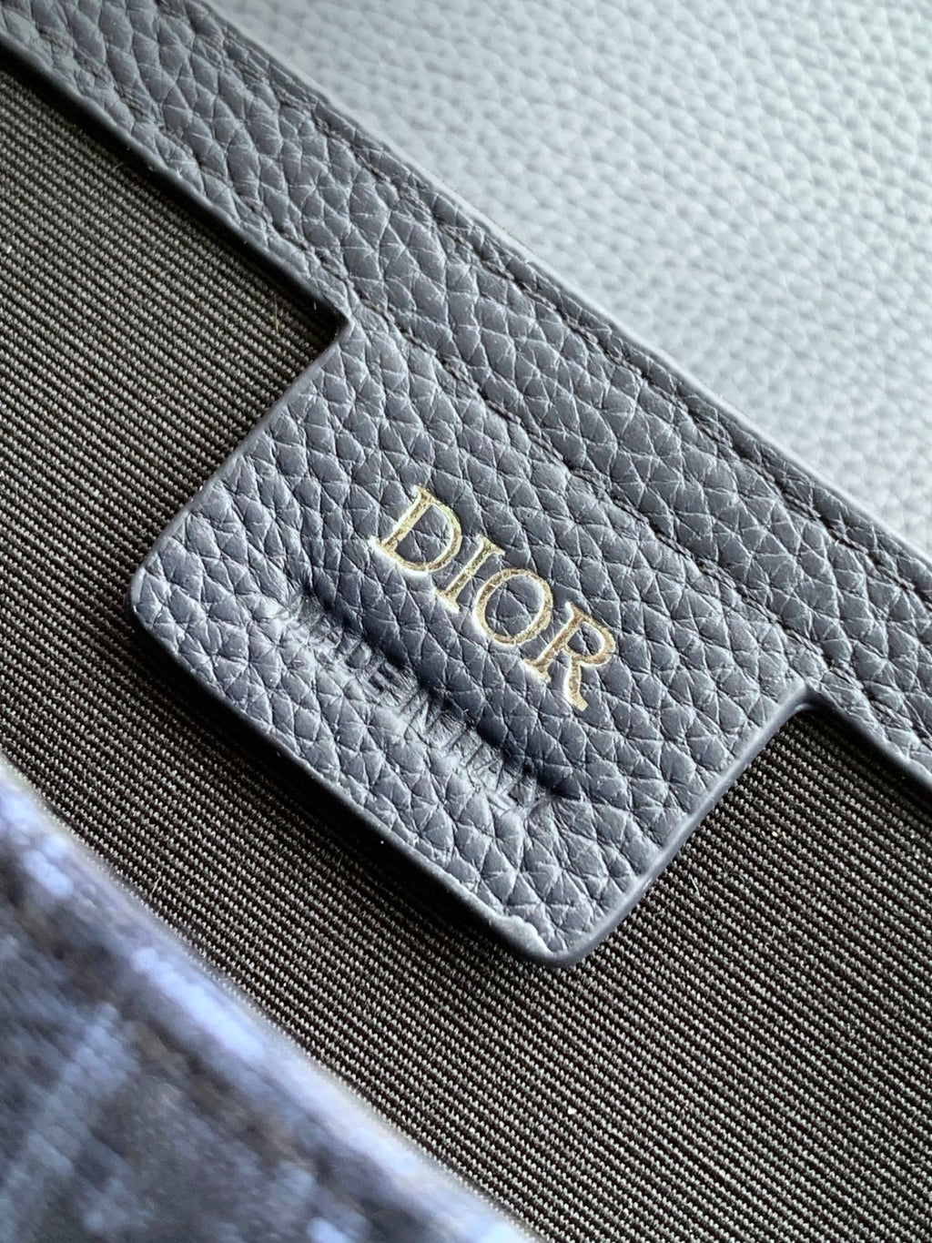 Dior bag strap tab with Dior logo, navy grained leather and monogram fabric