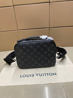 Men’s Louis Vuitton monogram crossbody bag with top zip and adjustable strap