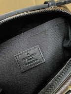 Louis Vuitton interior leather patch close-up inside the crossbody bag