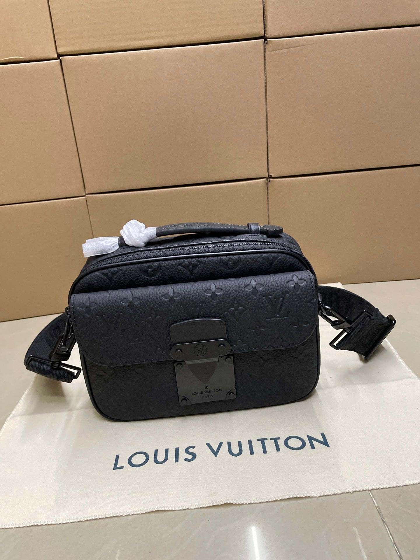 Louis Vuitton men's crossbody bag, dark monogram exterior with zip and adjustable strap