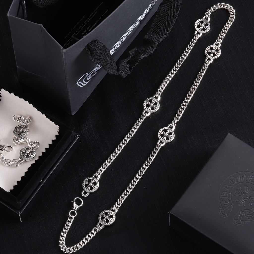 Silver-tone charm bracelet with round wheel pendants and adjustable chain