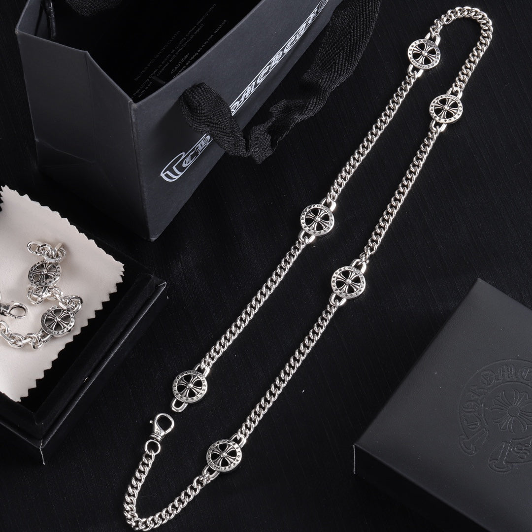 Silver-tone charm bracelet with round wheel pendants and adjustable chain