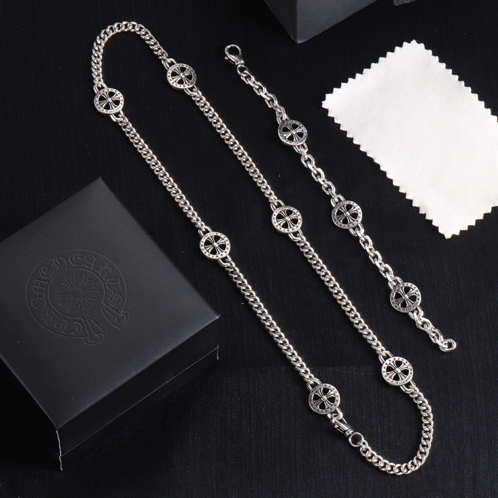 Silver-tone charm bracelet set with round wheel pendants and chain links